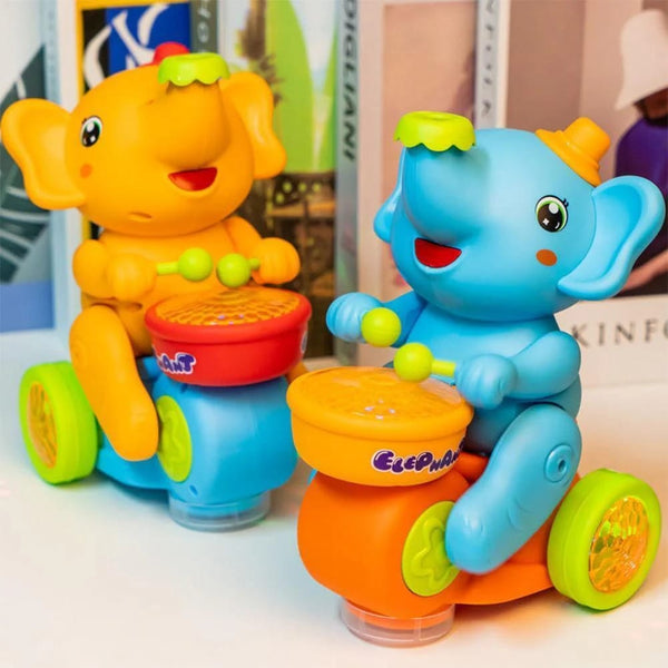MUSICAL BALL BLOWING & WALKING ELEPHANT TOY